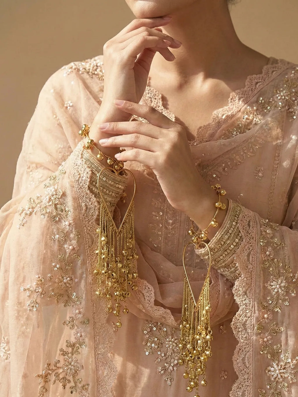 Bridal Heart-Shaped Golden Kaleere for Weddings – Long Dangling Kalire with Ghungroo Chains