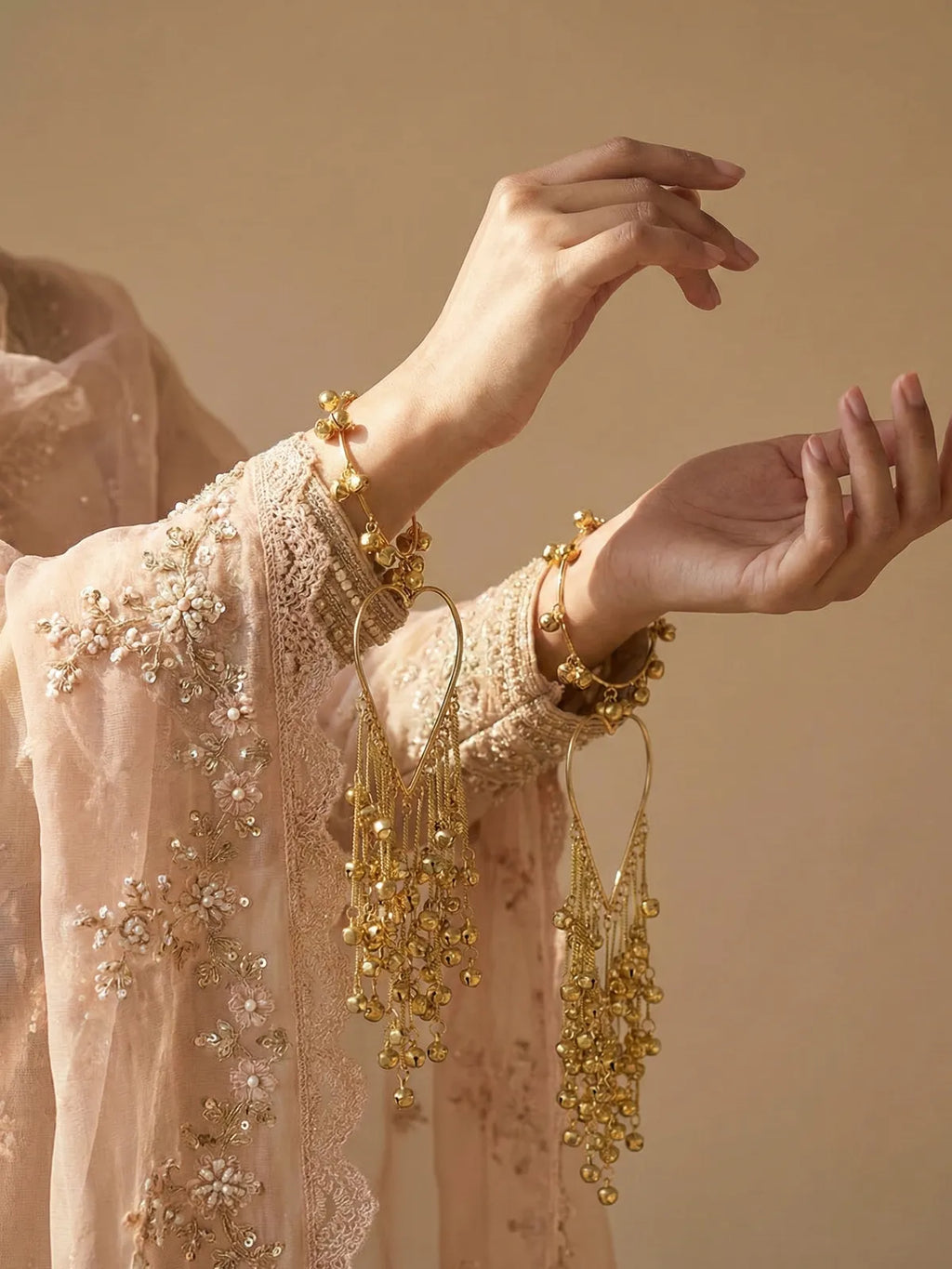 Bridal Heart-Shaped Golden Kaleere for Weddings – Long Dangling Kalire with Ghungroo Chains