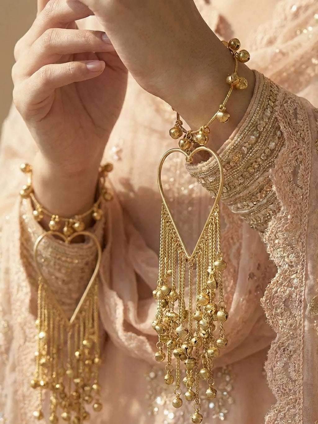 Bridal Heart-Shaped Golden Kaleere for Weddings – Long Dangling Kalire with Ghungroo Chains