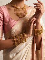 Celebration Luxe Gold Ghungroo Jewelry Set | 4 Bangles, Spiral Bracelet & Statement Necklace | 18K Gold-Plated Festive Wear
