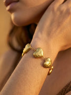 Dilruba Collection Gold-Toned Heart Charm Bracelet for Women | Elegant Statement Chain Bracelet for Everyday & Party Wear